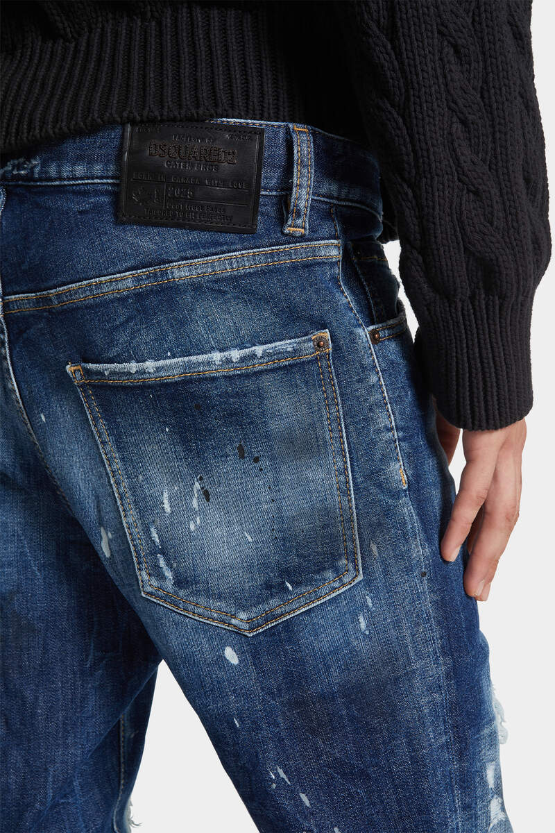 MEDIUM RIPPED WASH COOL GUY JEANS