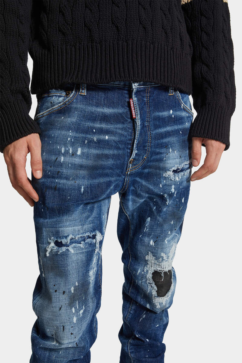 MEDIUM RIPPED WASH COOL GUY JEANS